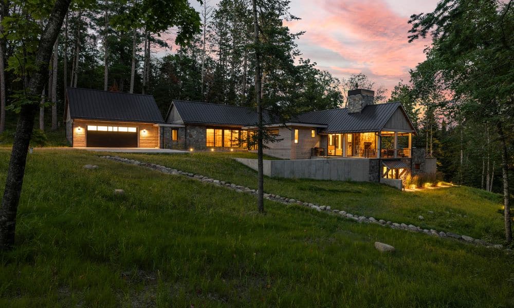 Thunder lake custom home retreat at night with sunset and lights