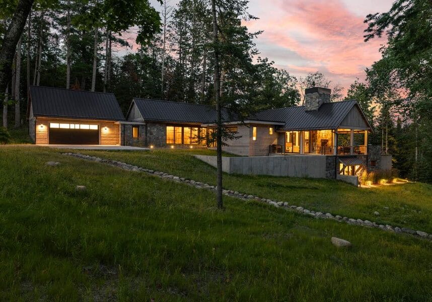 Thunder lake custom home retreat at night with sunset and lights